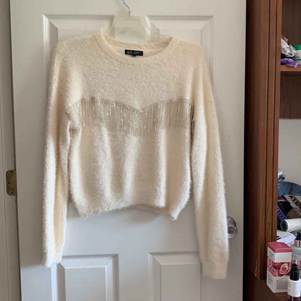 On 12th sweater silver tassels front new with out tag